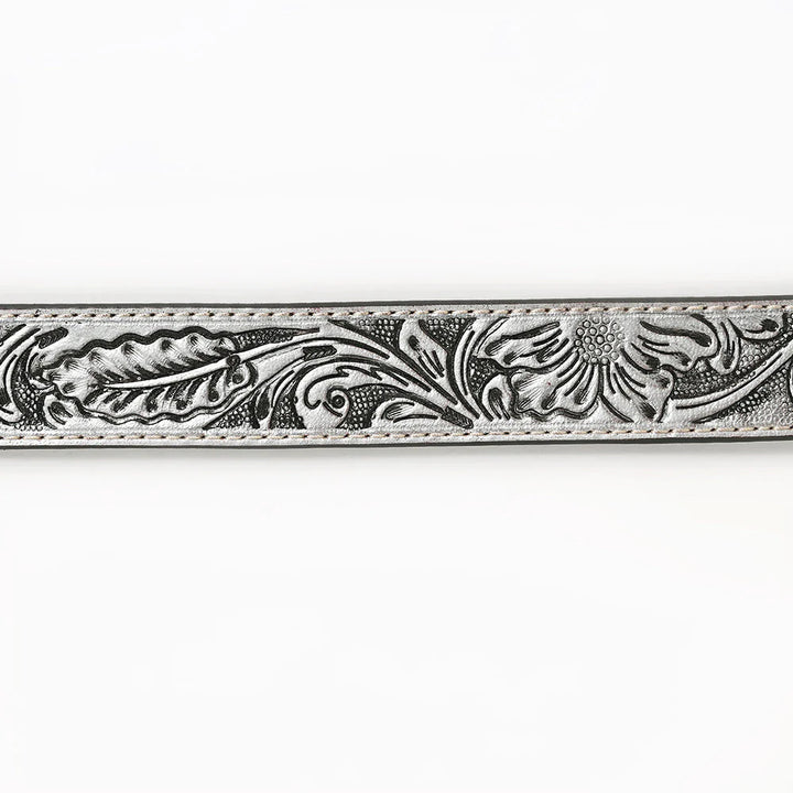American Darling Close-up of hand-tooled scroll floral detailing.