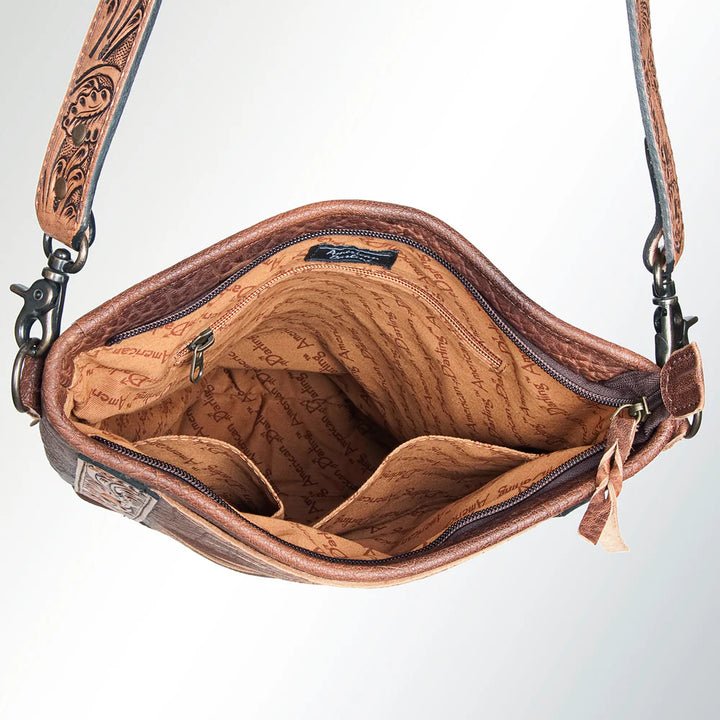 Interior of American Darling ADBG379BR crossbody showing main compartment, zip pocket, and lining