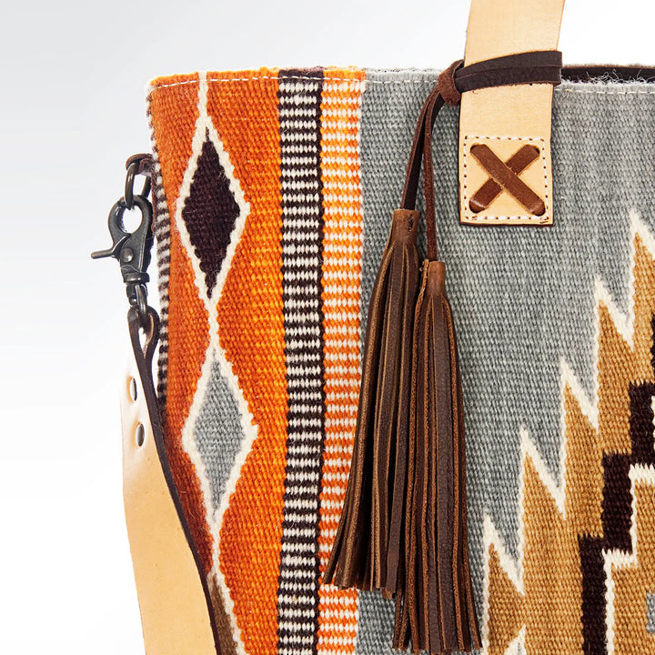 Close-up view of American Darling tote bag with zippered pockets, soft lining, and organizational compartments.