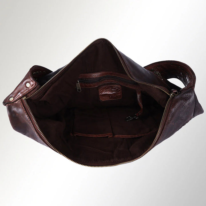 Interior of SWC135 Spaghetti Western tote showing zippered pocket, spacious lining, and organized compartments.
