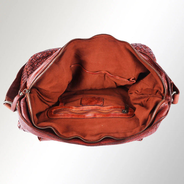 Interior of Spaghetti Western tote bag with full lining, zippered pocket, and open compartments for organized carry.
