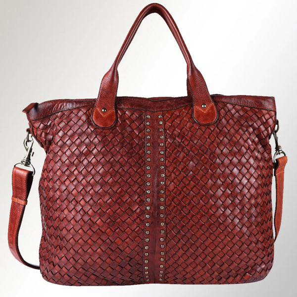 Side profile of Western tote bag featuring structured silhouette, genuine leather texture, and hand-tooled floral design.